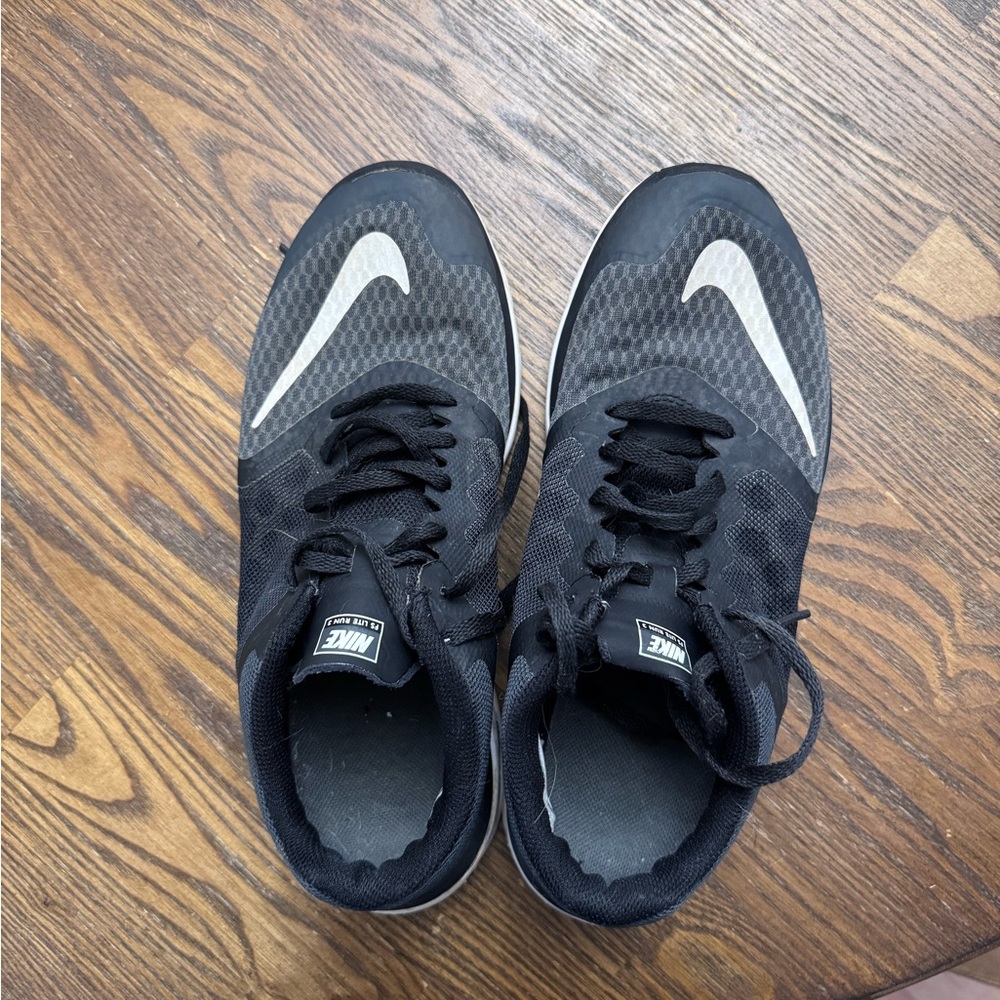 Nike womens Black Athletic Shoes with White Accents